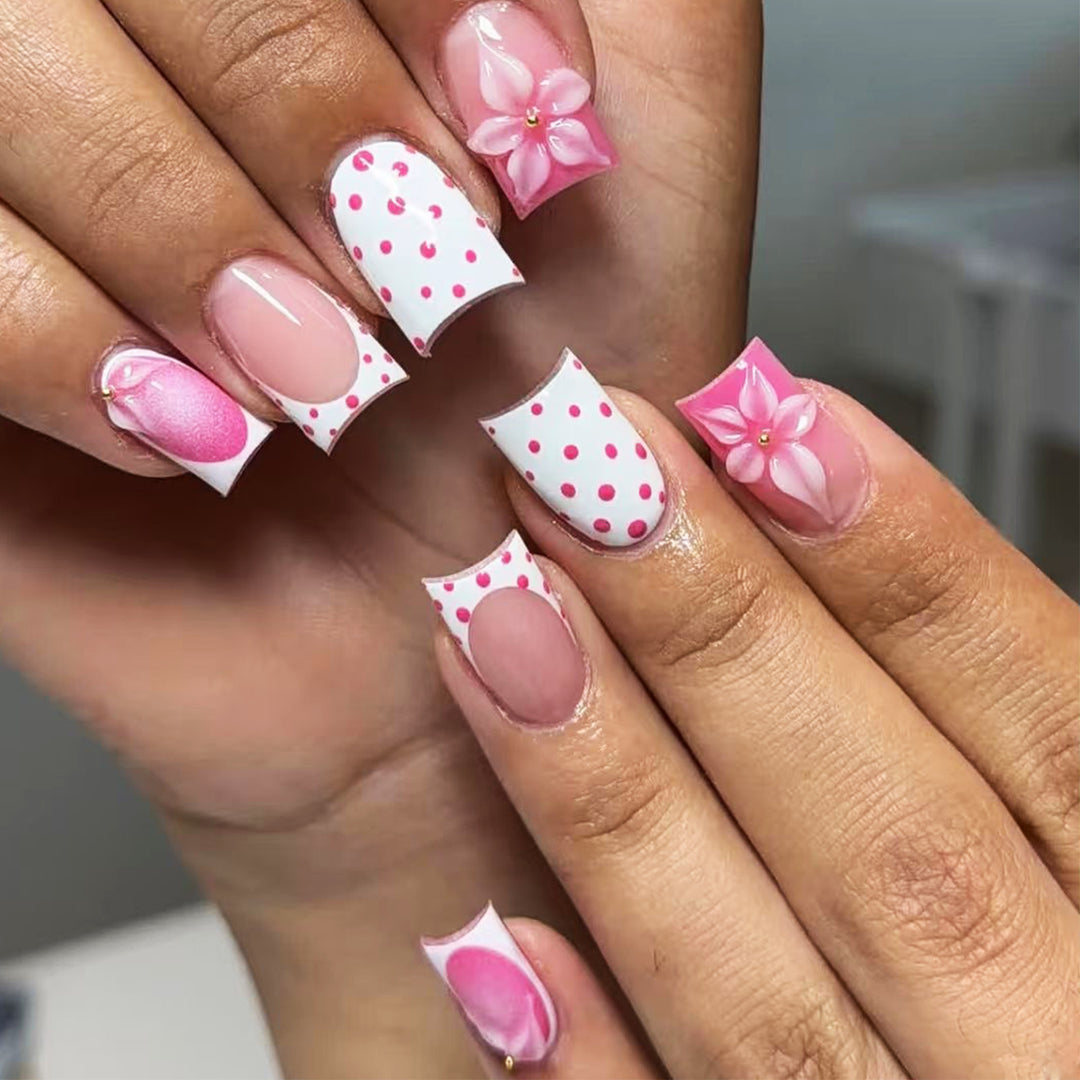 Artificial nail art with trendy flower decor and dots Stornfield