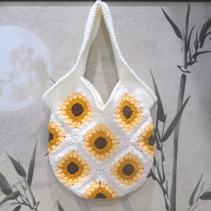 Handmade macrame shoulder bag with floral pattern Stornfield