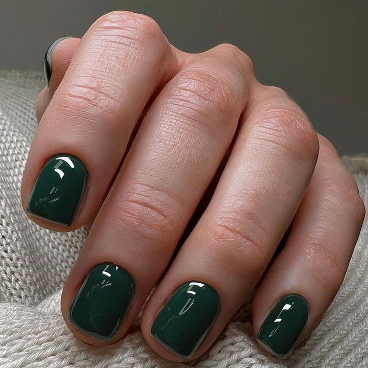 Acrylic nail set with luxurious color gradient and elegant lace accent Stornfield