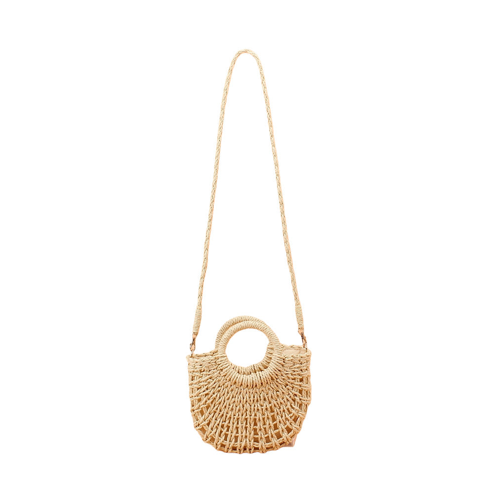 Shoulder bag made of woven natural material with round opening Stornfield
