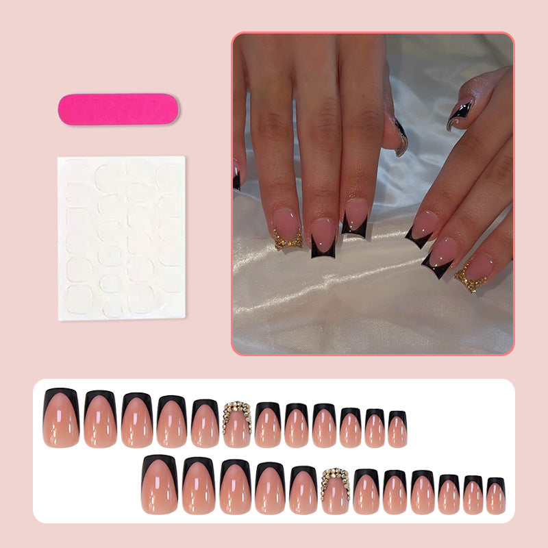 Acrylic nail set with elegant French design and glamorous accents Stornfield