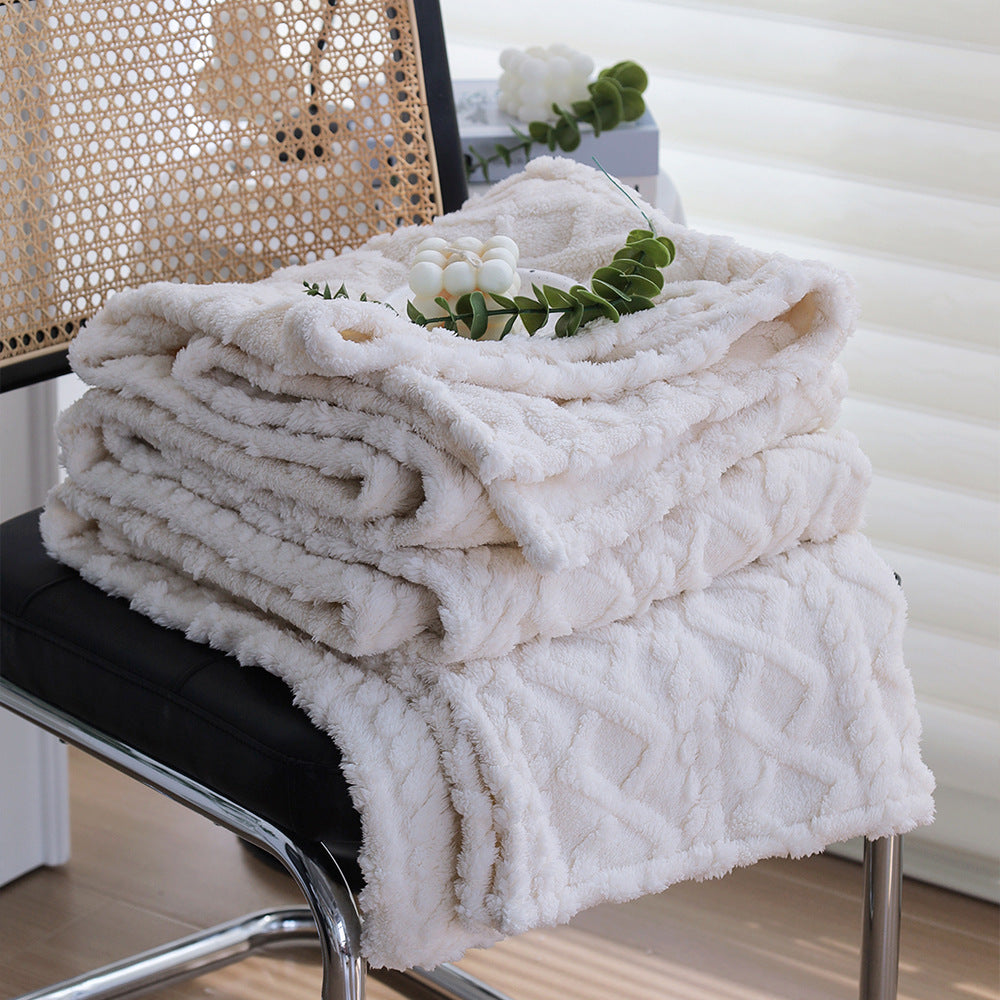 Cuddle blanket with textured surface