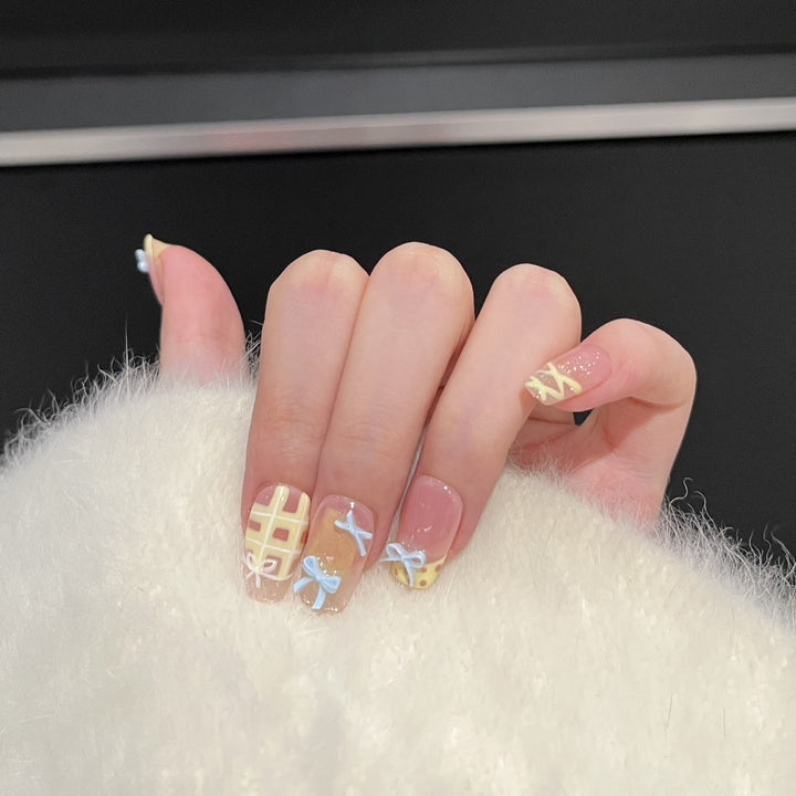 Decorative Press-On Nail Art Set with Charming Bow and Pattern Designs Stornfield