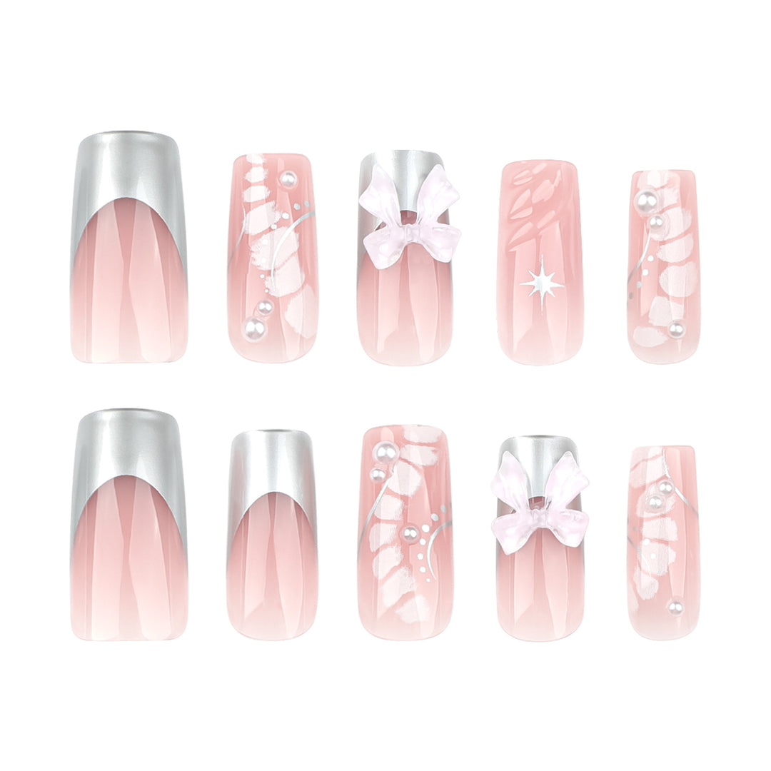 Glamorous artificial nails with elegant decorations Stornfield
