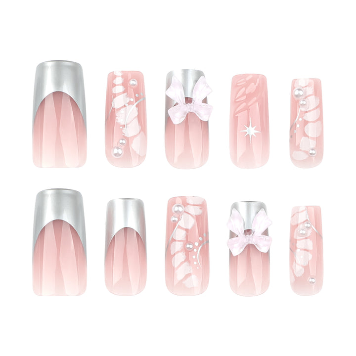 Glamorous artificial nails with elegant decorations Stornfield