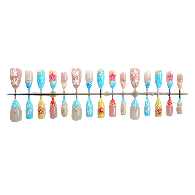 Elegant artificial nail set with floral details and glitter accents Stornfield