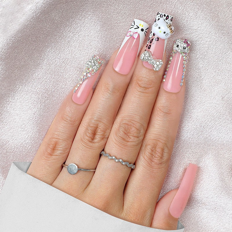 Glamorous artificial nail set with sparkling rhinestone embellishments and creative animal designs Stornfield