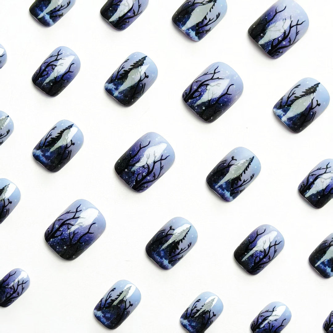 Artificial nail art with winter forest motif Stornfield