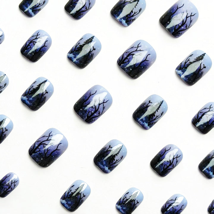 Artificial nail art with winter forest motif Stornfield