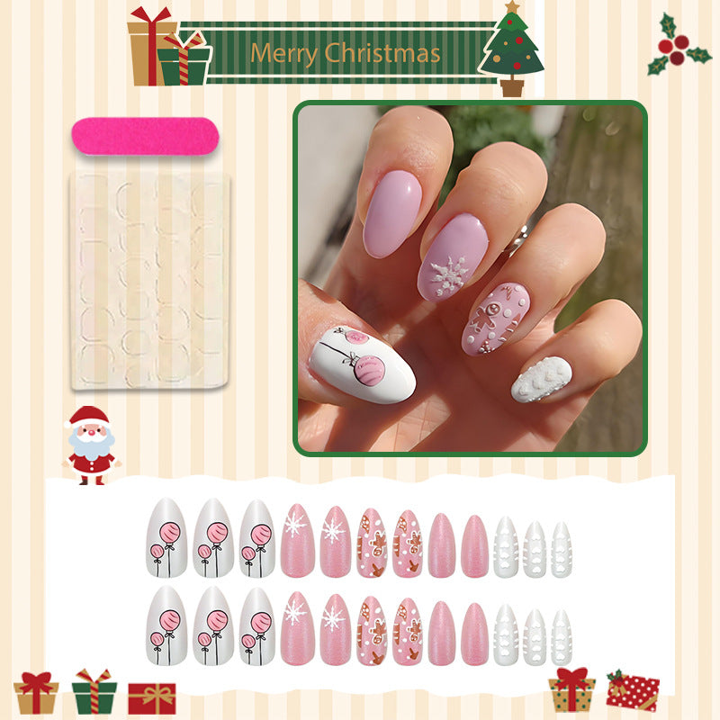 Acrylic nail set with festive Christmas designs and elegant embellishments Stornfield