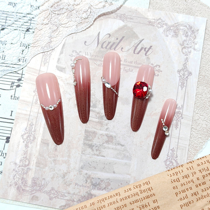 Artificial nails with glamorous rhinestone decorations Stornfield