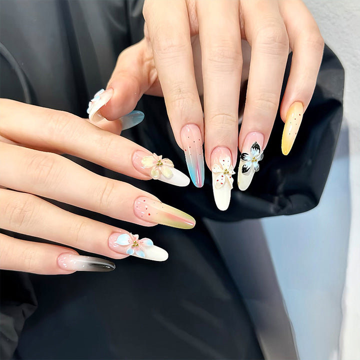 Artificial nail set with floral and glittering decorations Stornfield