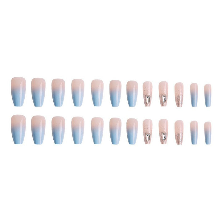 Nail set with elegant ombre and glitter accents Stornfield