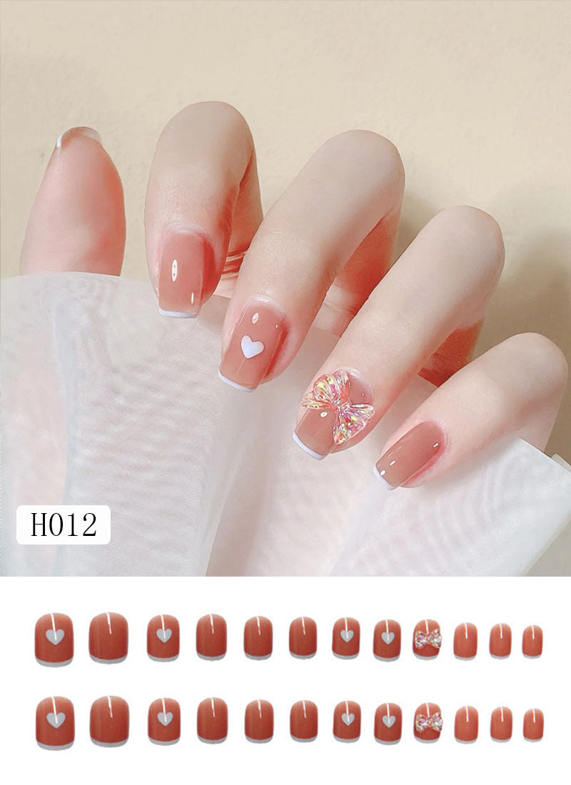 Artificial nail tips with bow design Stornfield