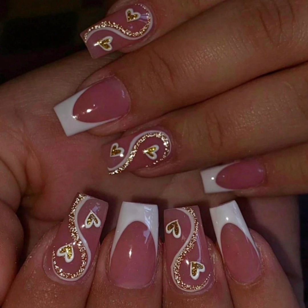 Artificial nail set with elegant heart decorations and glitter accents Stornfield