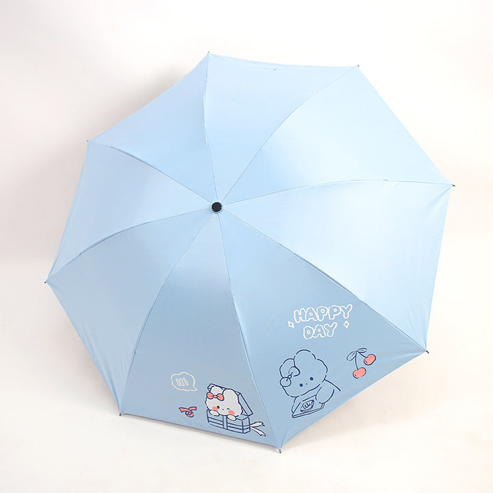Ladies folding umbrella with playful design and cheerful Stornfield motif