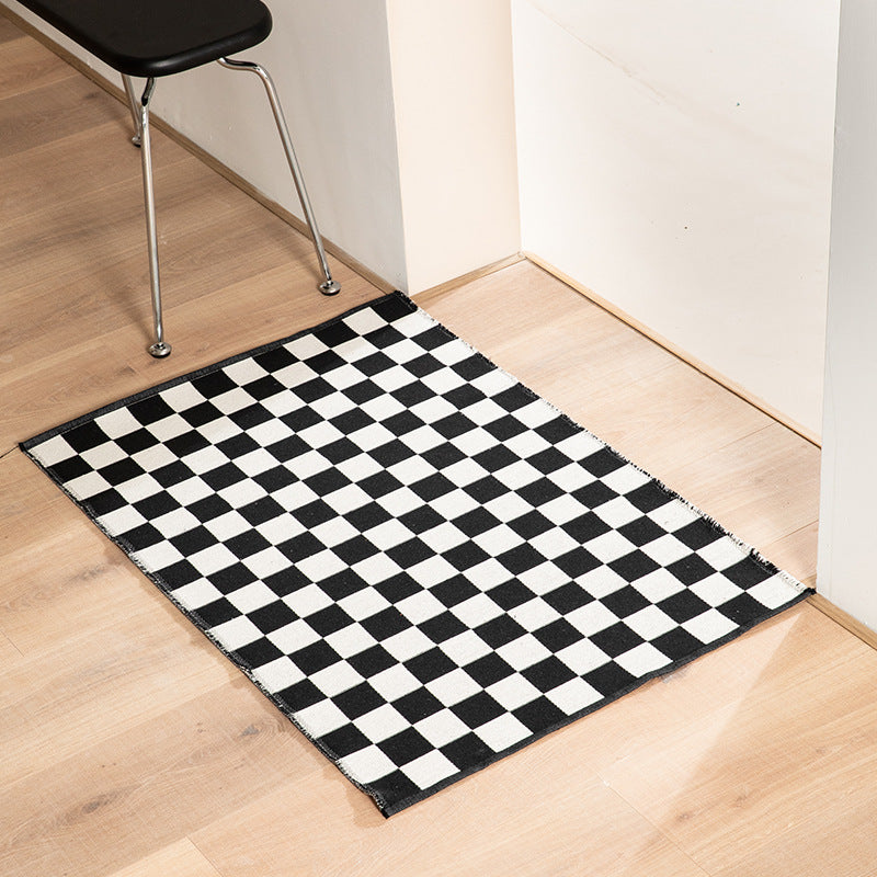 Flat-woven bath mat with abstract geometric pattern Stornfield