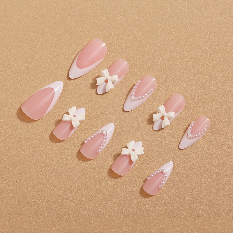 Artificial nail set with elegant bows and 3D decorations Stornfield