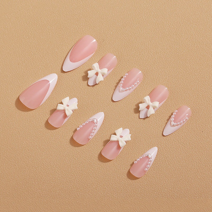 Artificial nail set with elegant bows and 3D decorations Stornfield