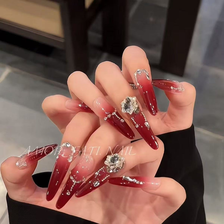 Glamorous artificial nail tips with elegant decorations Stornfield