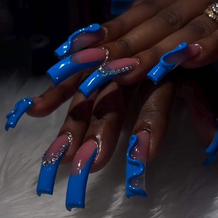 Creative Stiletto Nail Enhancements with Aqua-Gem Accents Stornfield