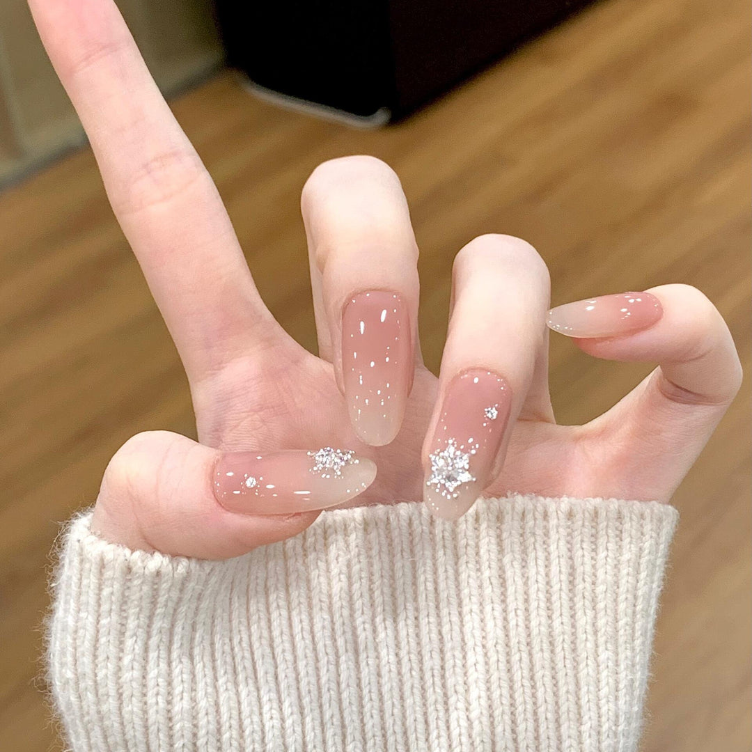 Artificial nails with shimmering effect and elegant star motif Stornfield