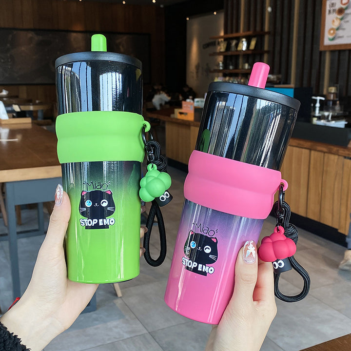 Women's playful coffee mug with silicone sleeve and integrated pendant Stornfield