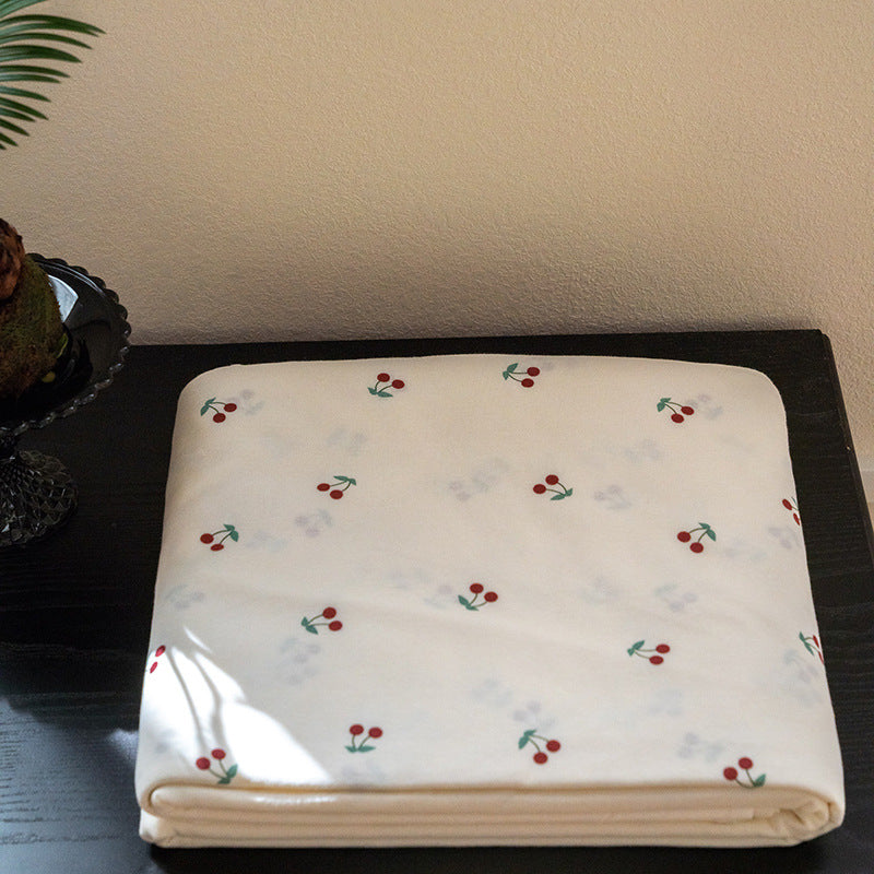 Organic Cotton Muslin Swaddle Blanket with Playful Cartoon Print