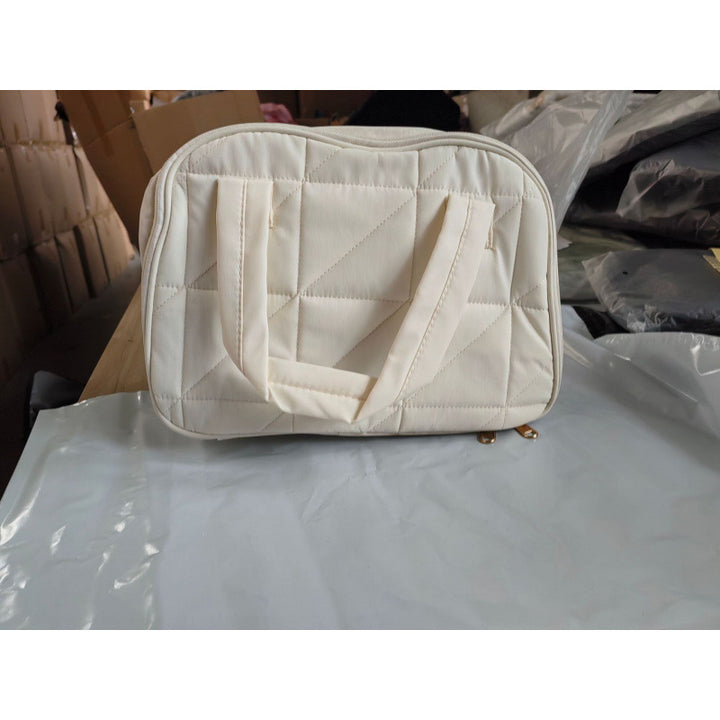 Cosmetic bag with padded interior compartment Stornfield