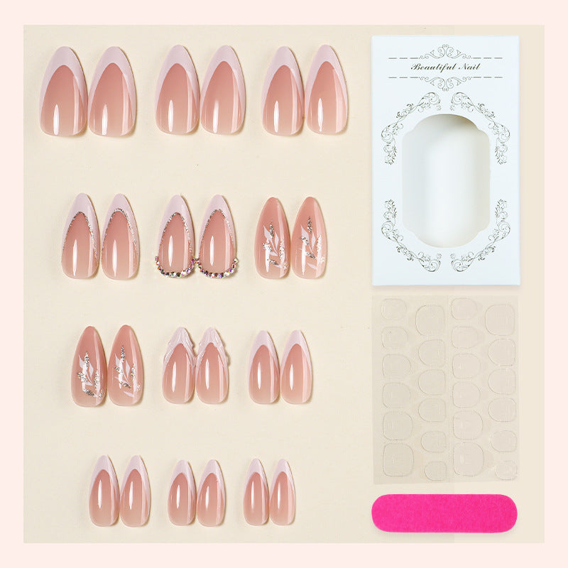 Artificial nail set with elegant tips and glitter accents Stornfield