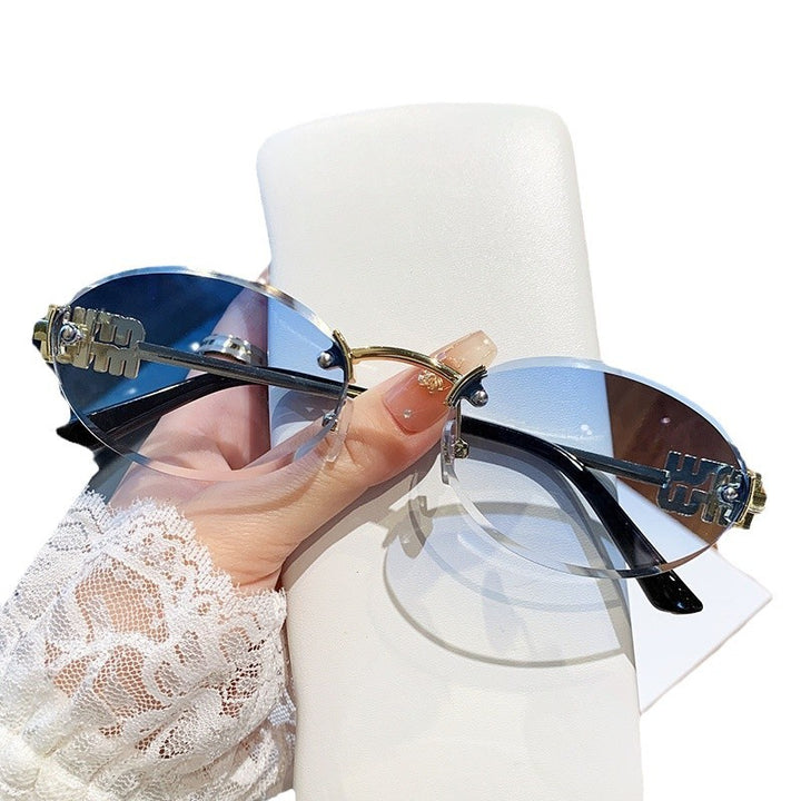 Ladies fashionable sunglasses in elegant oval design Stornfield