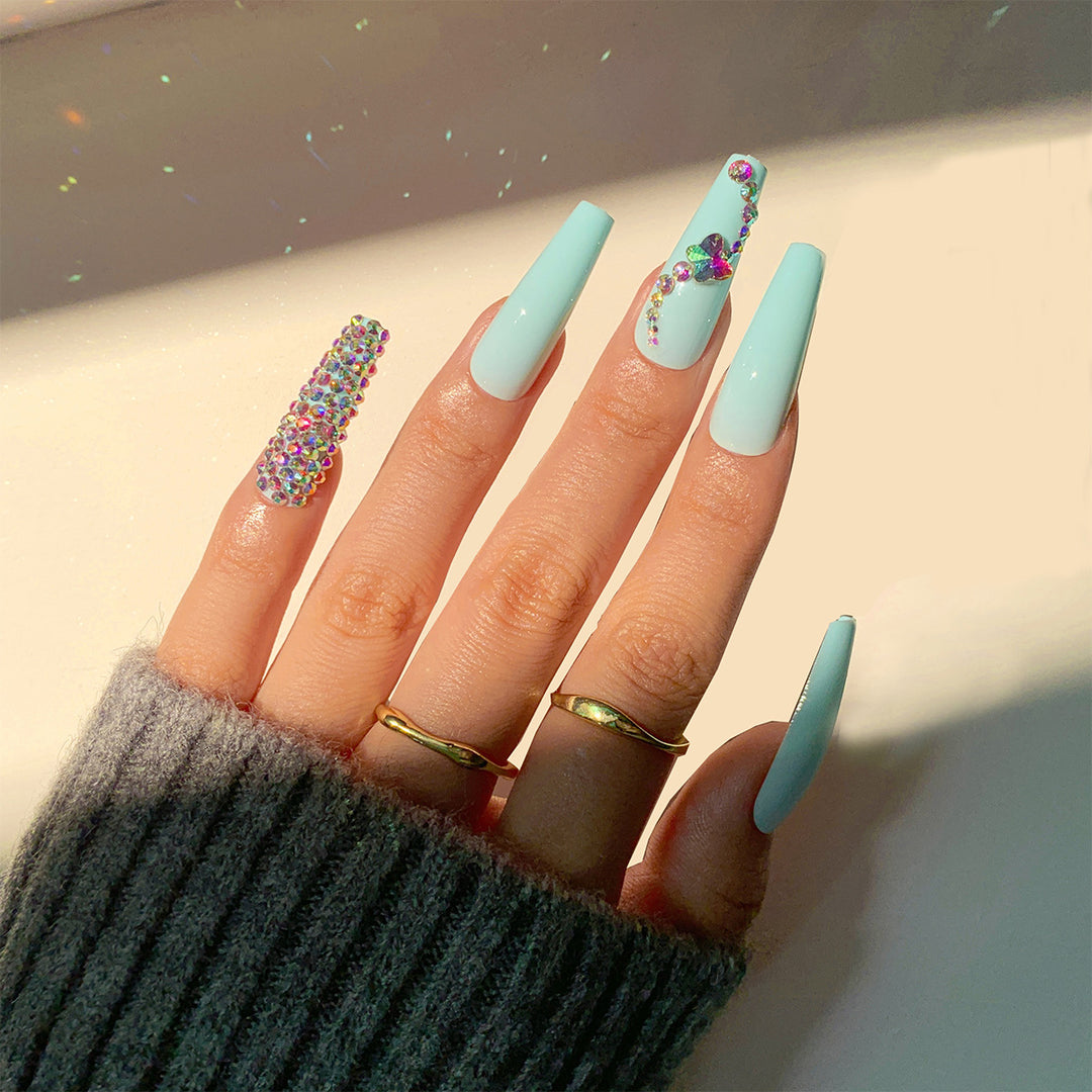 Glamorous artificial nails with sparkling rhinestone embellishments Stornfield
