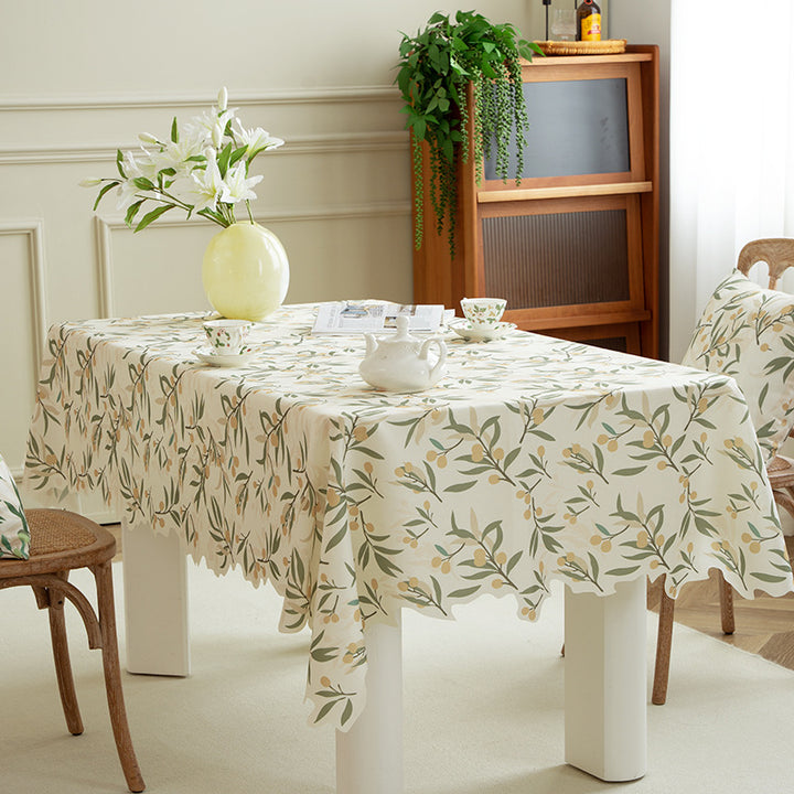 Rectangular tablecloth with olive branch pattern and wavy hem