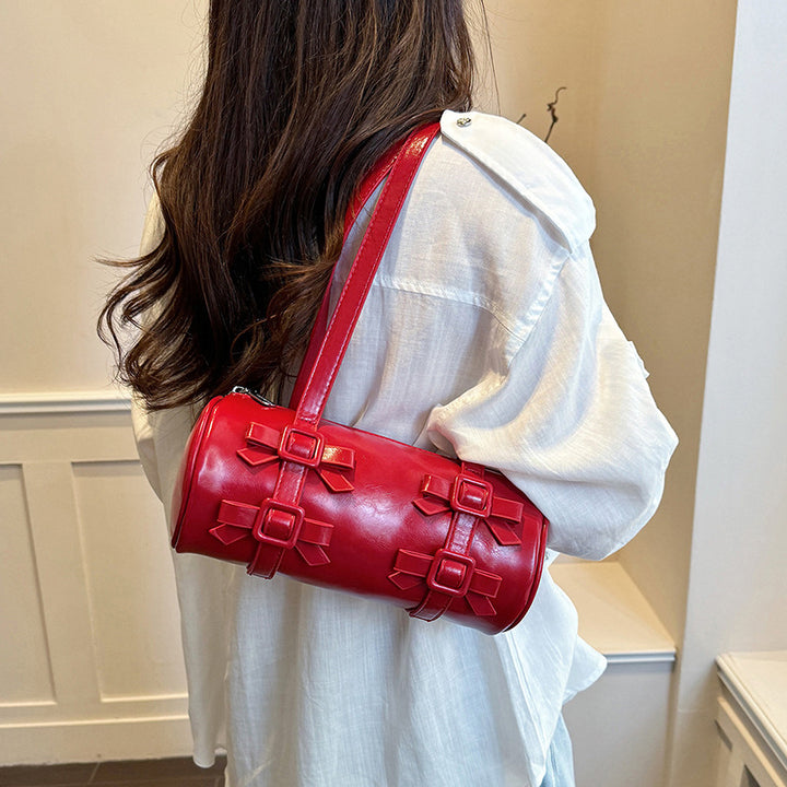 Bow-Accent Barrel Bag