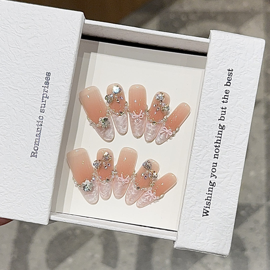 Artificial nails with romantic rhinestone details Stornfield