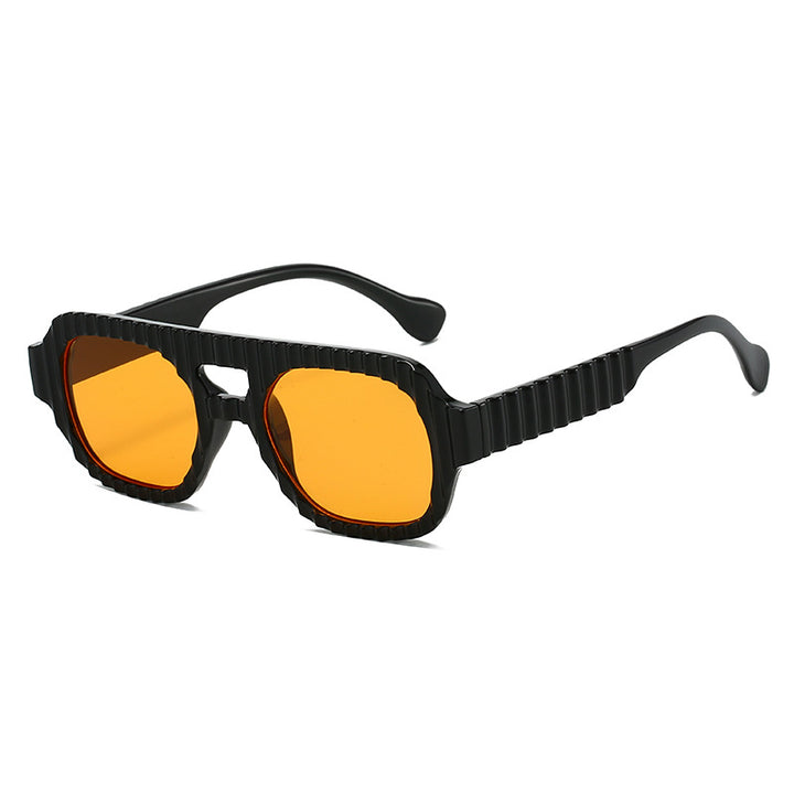 Ladies fashionable sunglasses in futuristic design with textured frame Stornfield