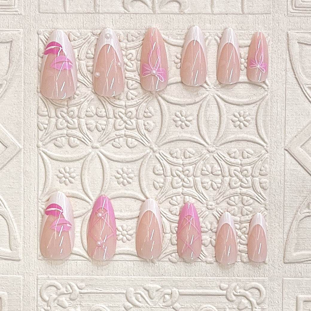 Artistic Press-On Nail Set with Kiss and Bow Design Stornfield