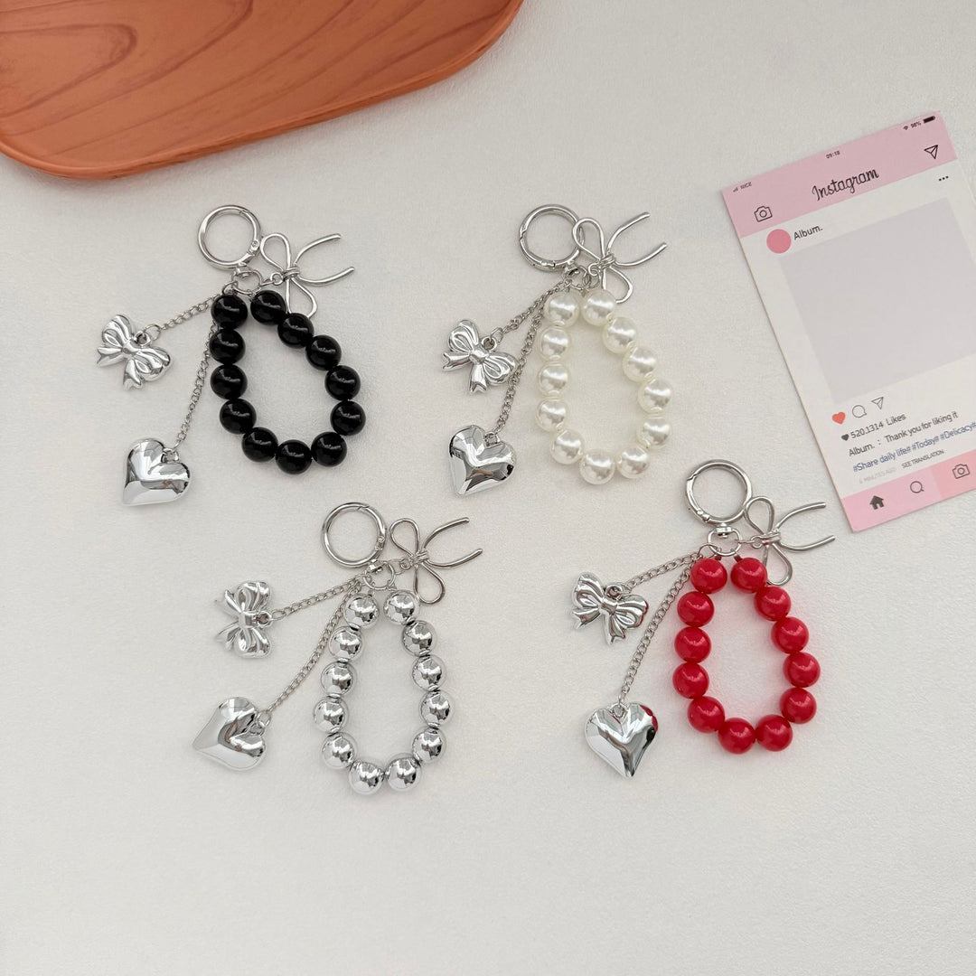 Elegant Heart and Bow Charm Keychain Stornfield