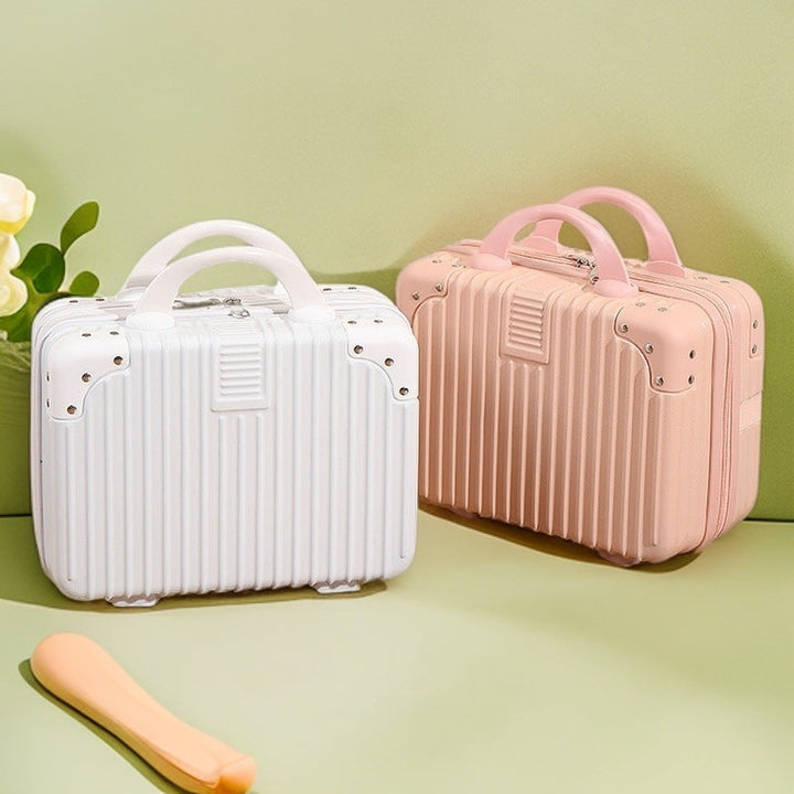 structured hard-shell vanity travel case with faux-leather corner reinforcements and dual top handles Stornfield