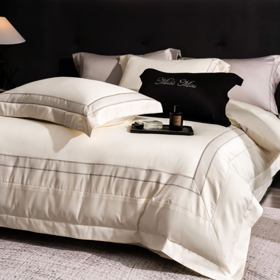 Luxurious cotton bedding set with quilted blanket and fine pillowcases