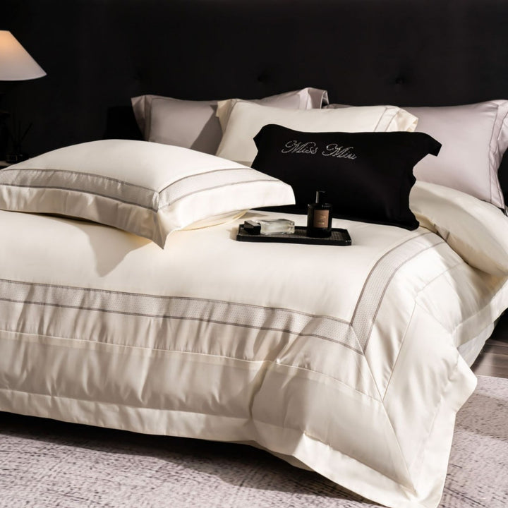 Luxurious cotton bedding set with quilted blanket and fine pillowcases
