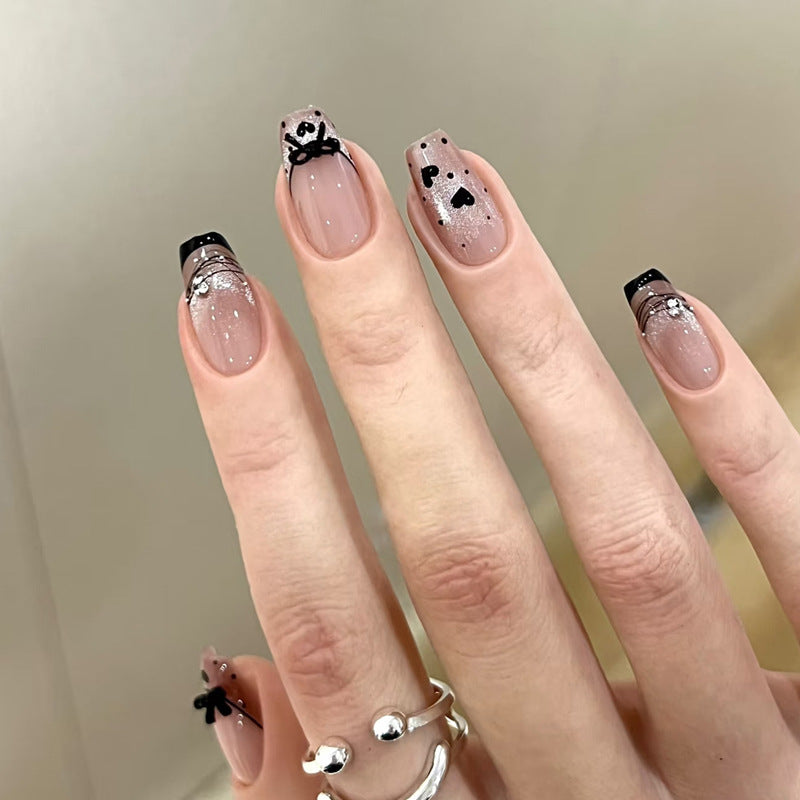 Elegant Artful Nail Design with Bow and Sparkle Accents Stornfield