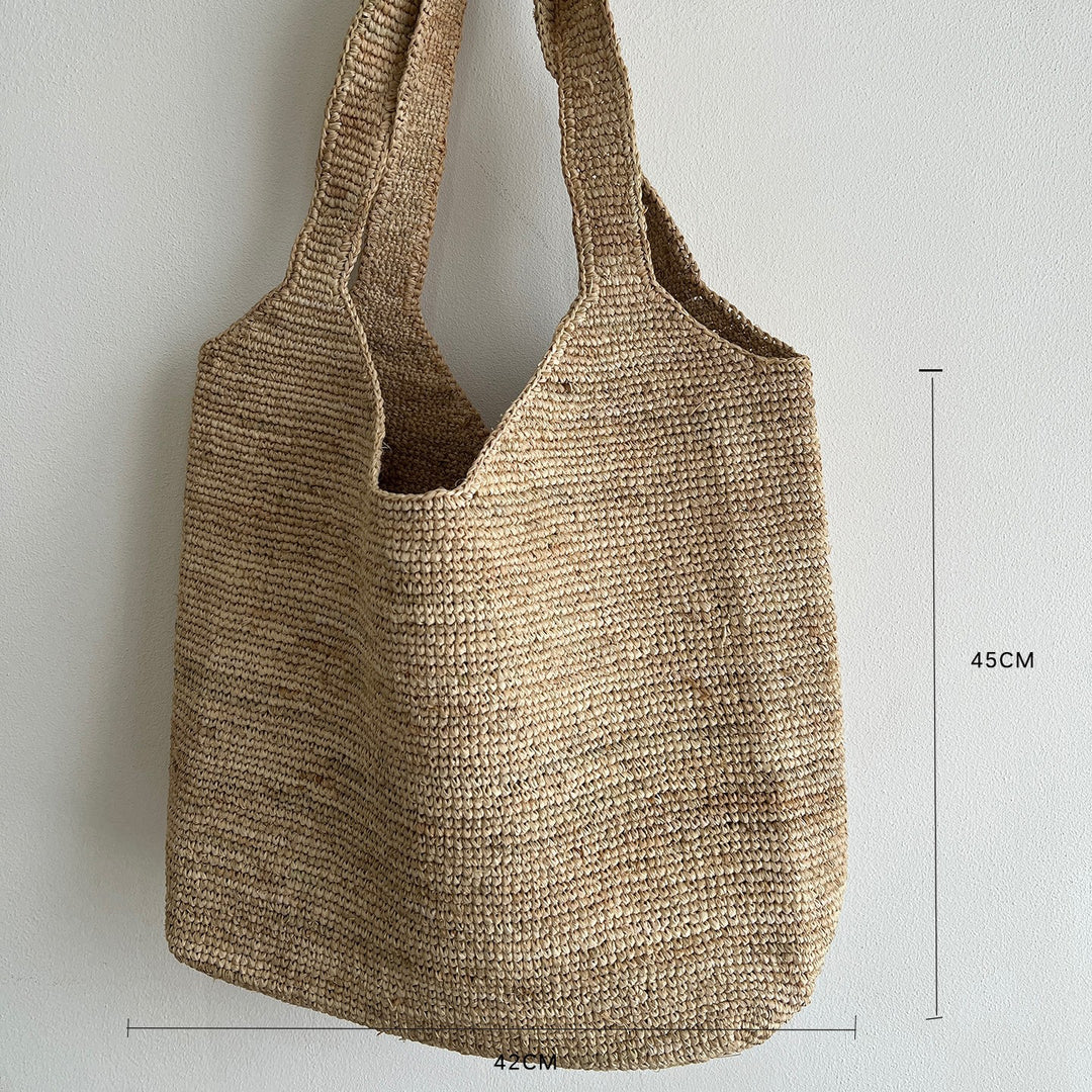 Handcrafted knitted bag with floral design Stornfield