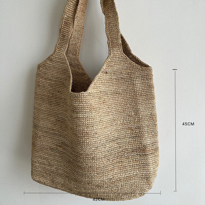 Handcrafted knitted bag with floral design Stornfield