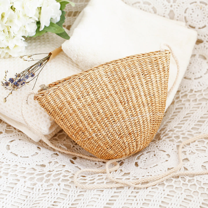 Handcrafted straw clutch with elegant design Stornfield