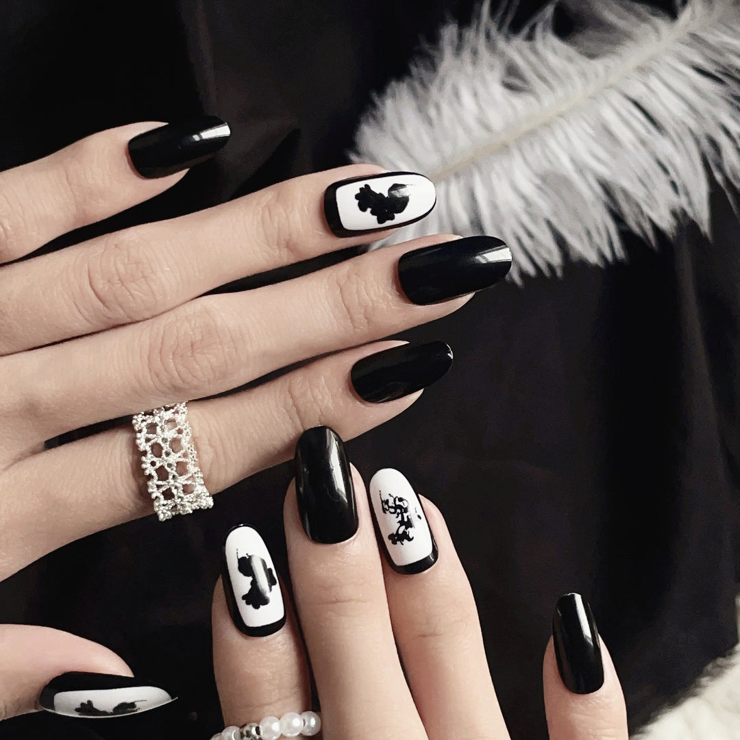 Artistic Press-On Nail Set with Floral and Abstract Designs