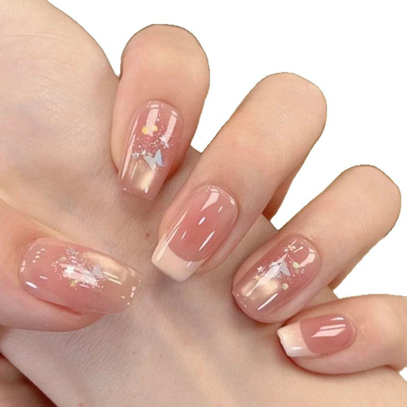 Stylish Press-On Nail Extensions with Artistic Accents