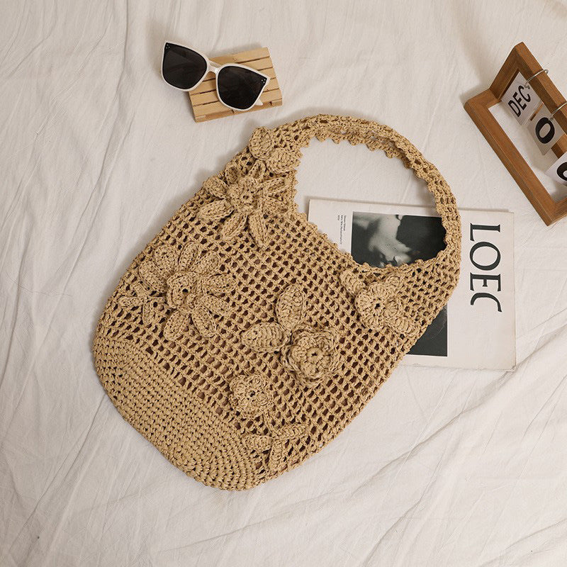 Crocheted shoulder bag with floral appliqués Stornfield