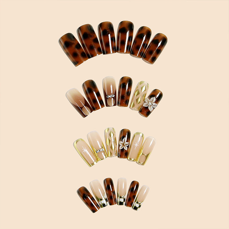 Elegant artificial nails with floral and glittering details Stornfield