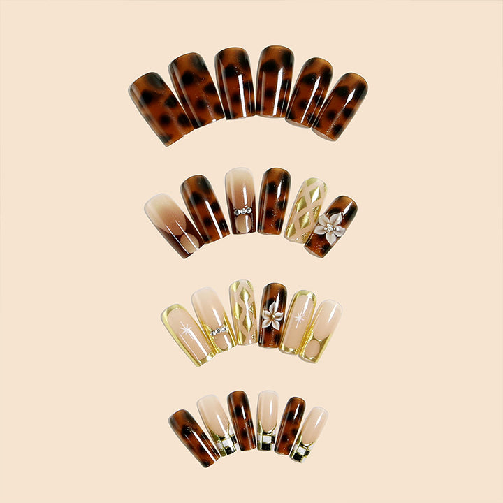Elegant artificial nails with floral and glittering details Stornfield